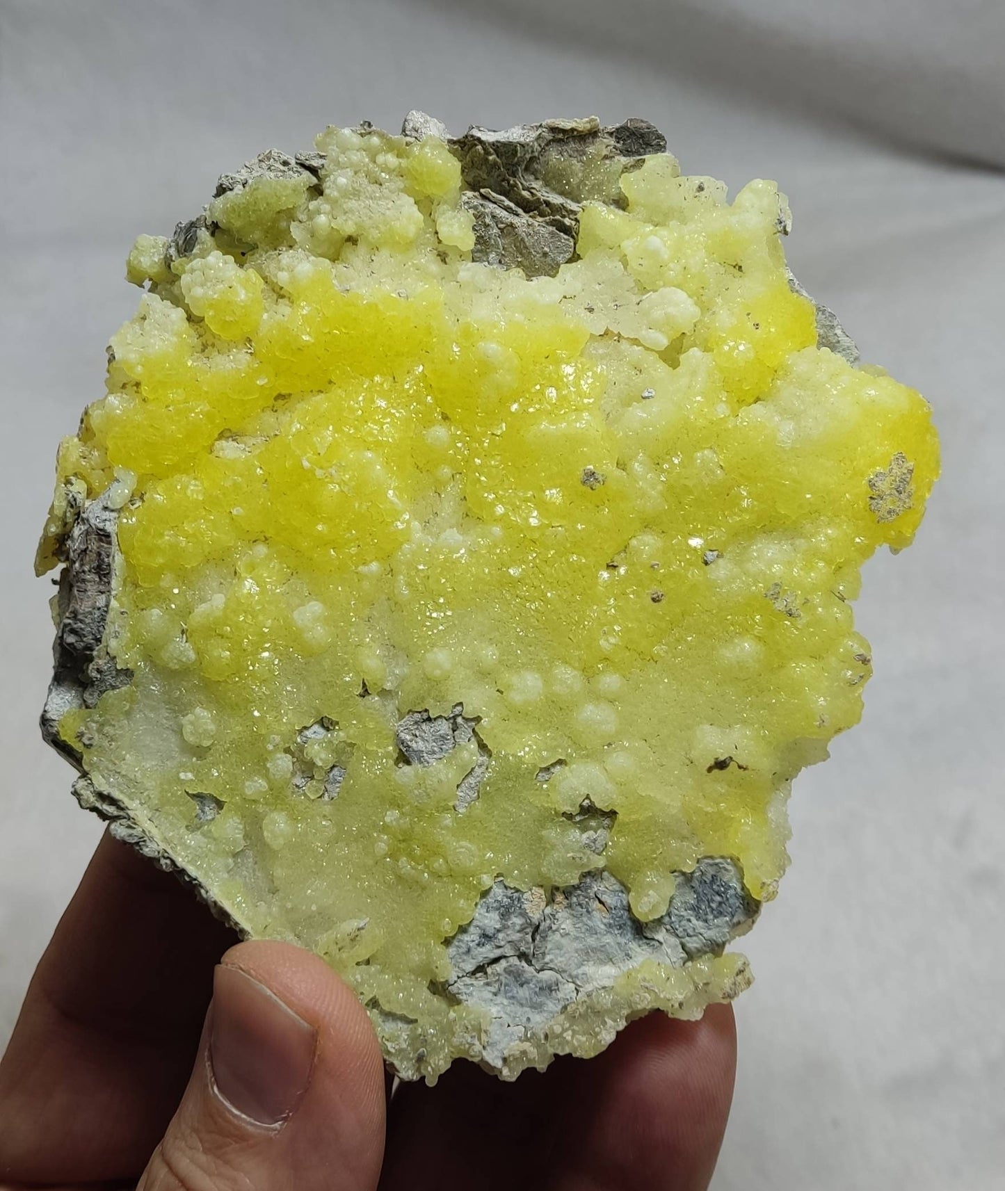 An amazing specimen of Natural yellow color Brucite crystal specimen with chromite 150 grams