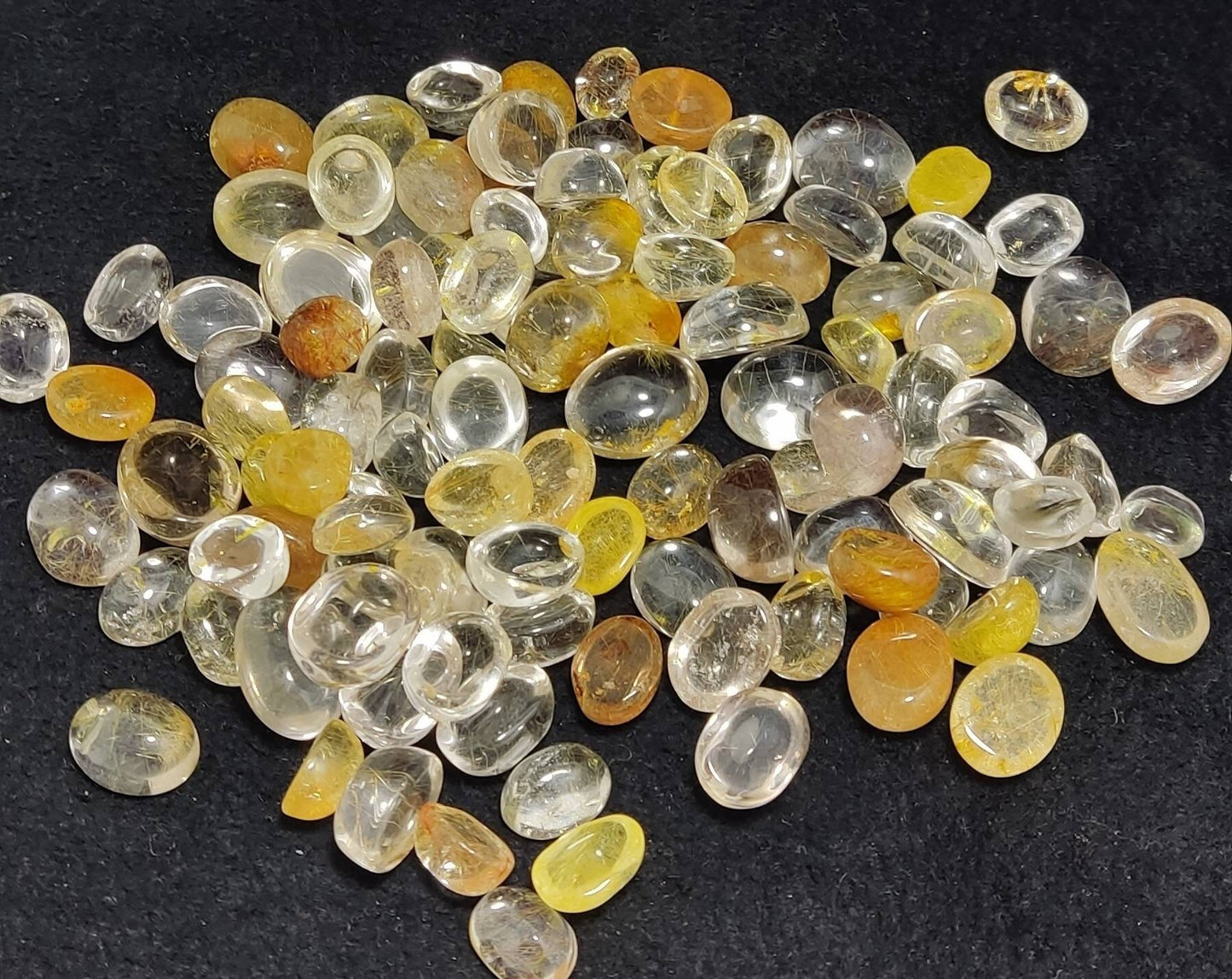 An amazing lot of Rutile included polished quartz Cabochons more than 100 pieces