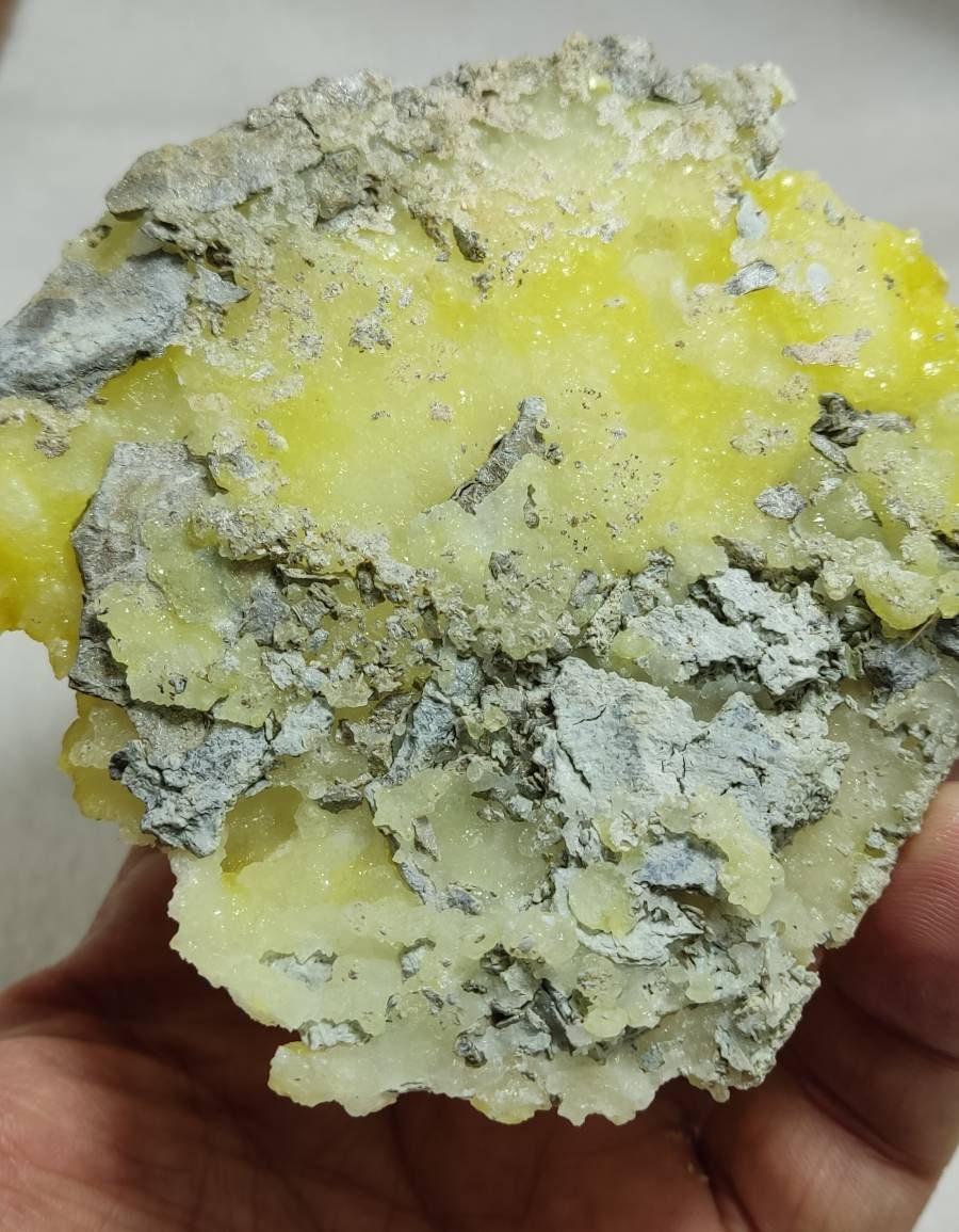 An amazing specimen of Natural yellow color Brucite crystal specimen with chromite 150 grams