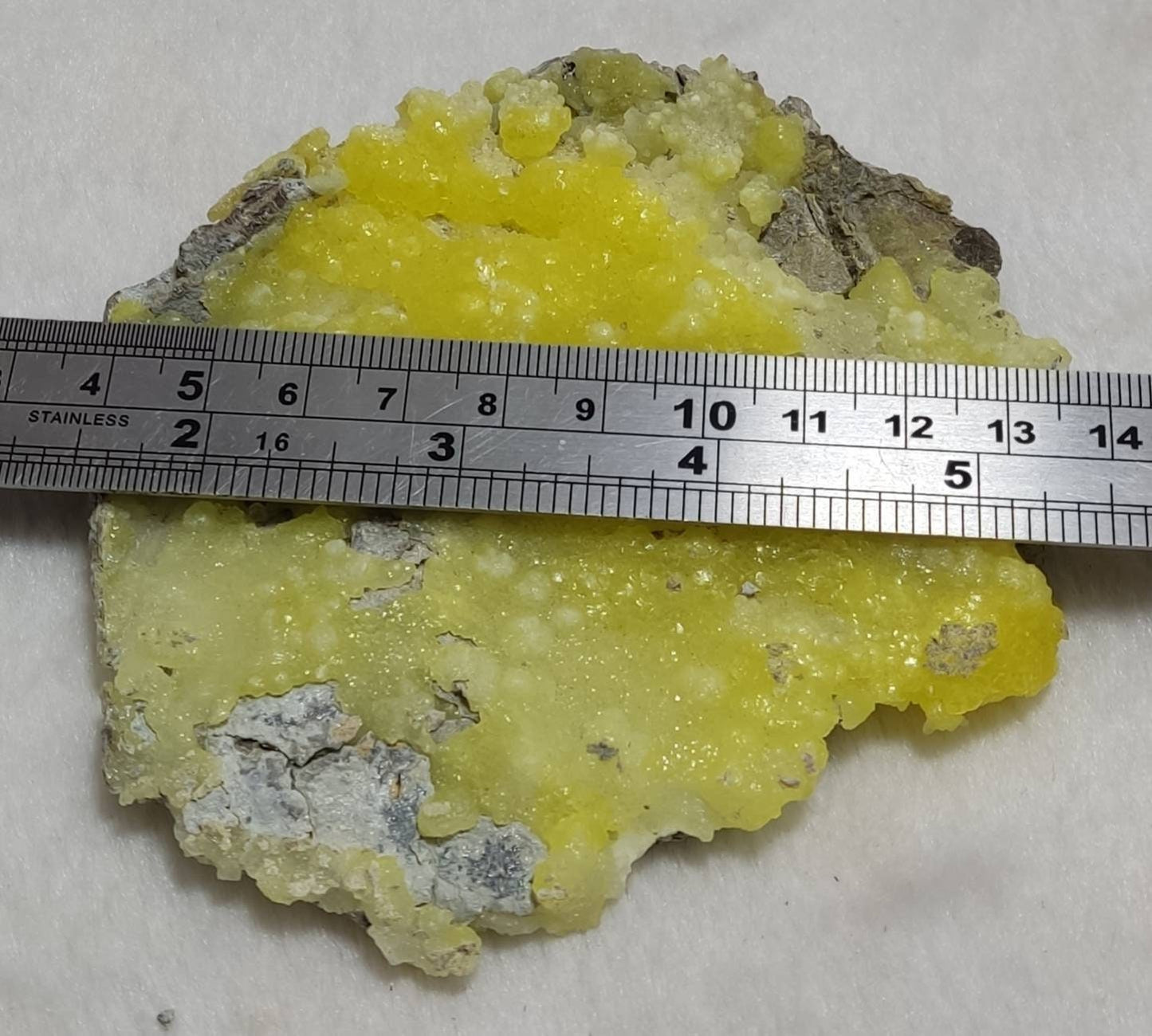 An amazing specimen of Natural yellow color Brucite crystal specimen with chromite 150 grams