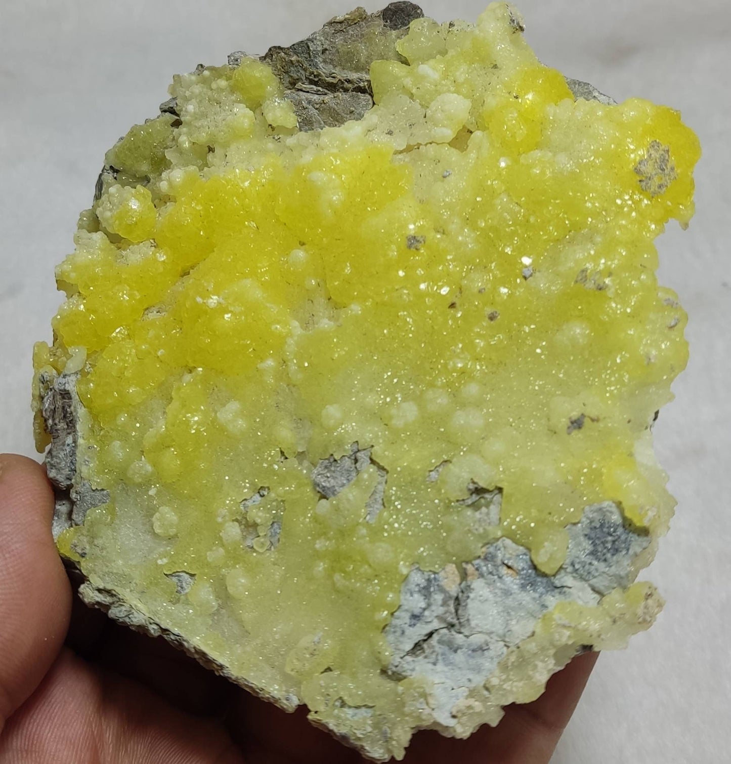 An amazing specimen of Natural yellow color Brucite crystal specimen with chromite 150 grams