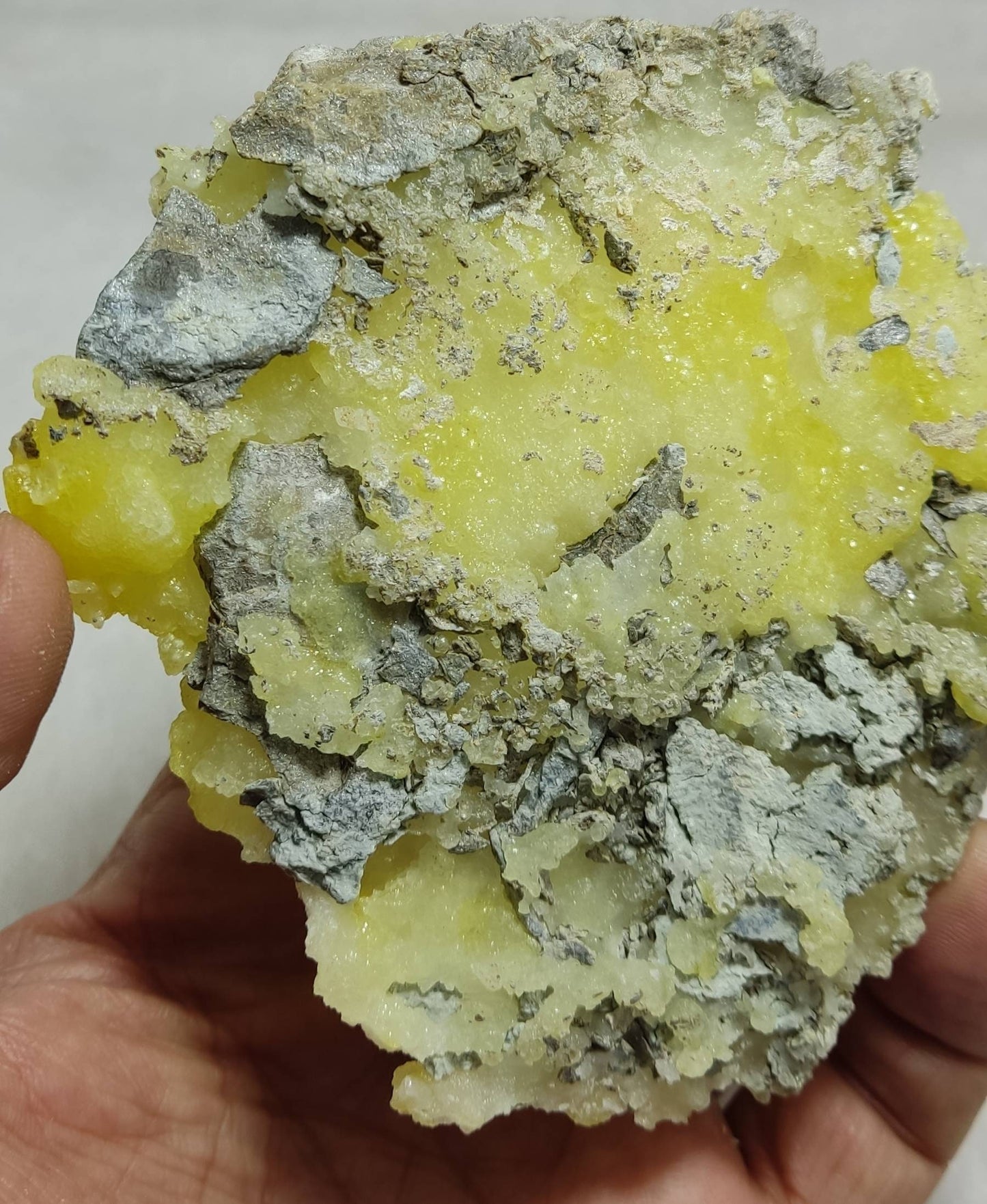 An amazing specimen of Natural yellow color Brucite crystal specimen with chromite 150 grams