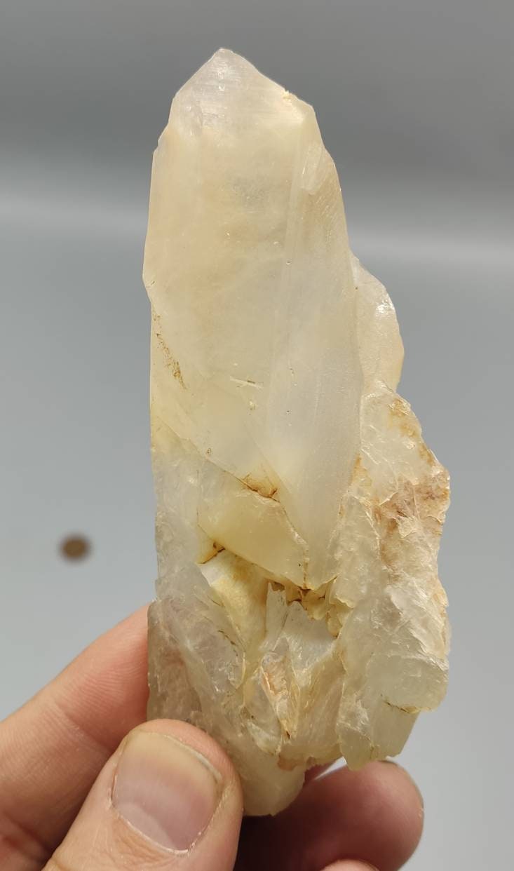 Natural Terminated Quartz crystal having amphibole inclusions 137 grams