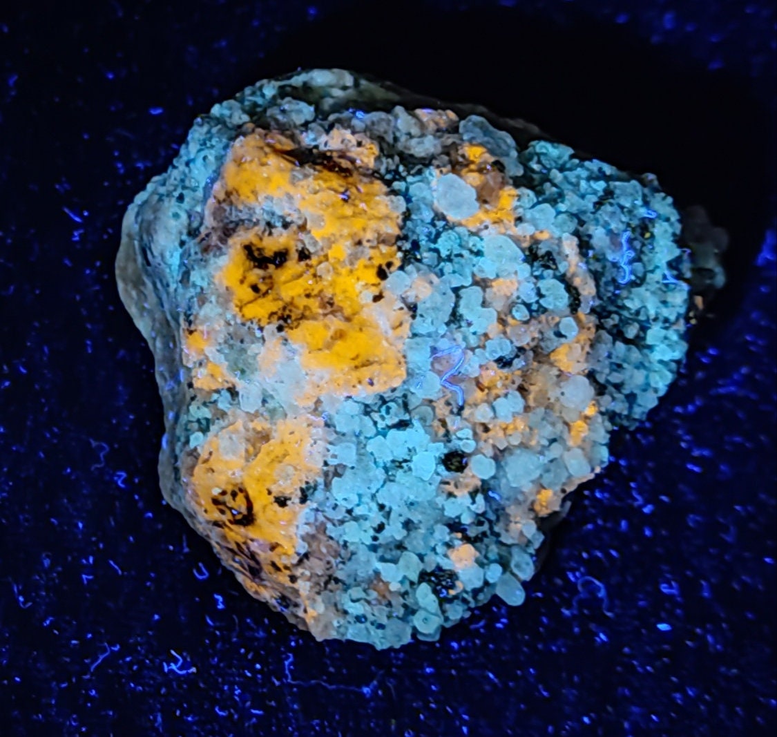 Afghanite Fluorescent in matrix with some pyrite calcite 88 grams
